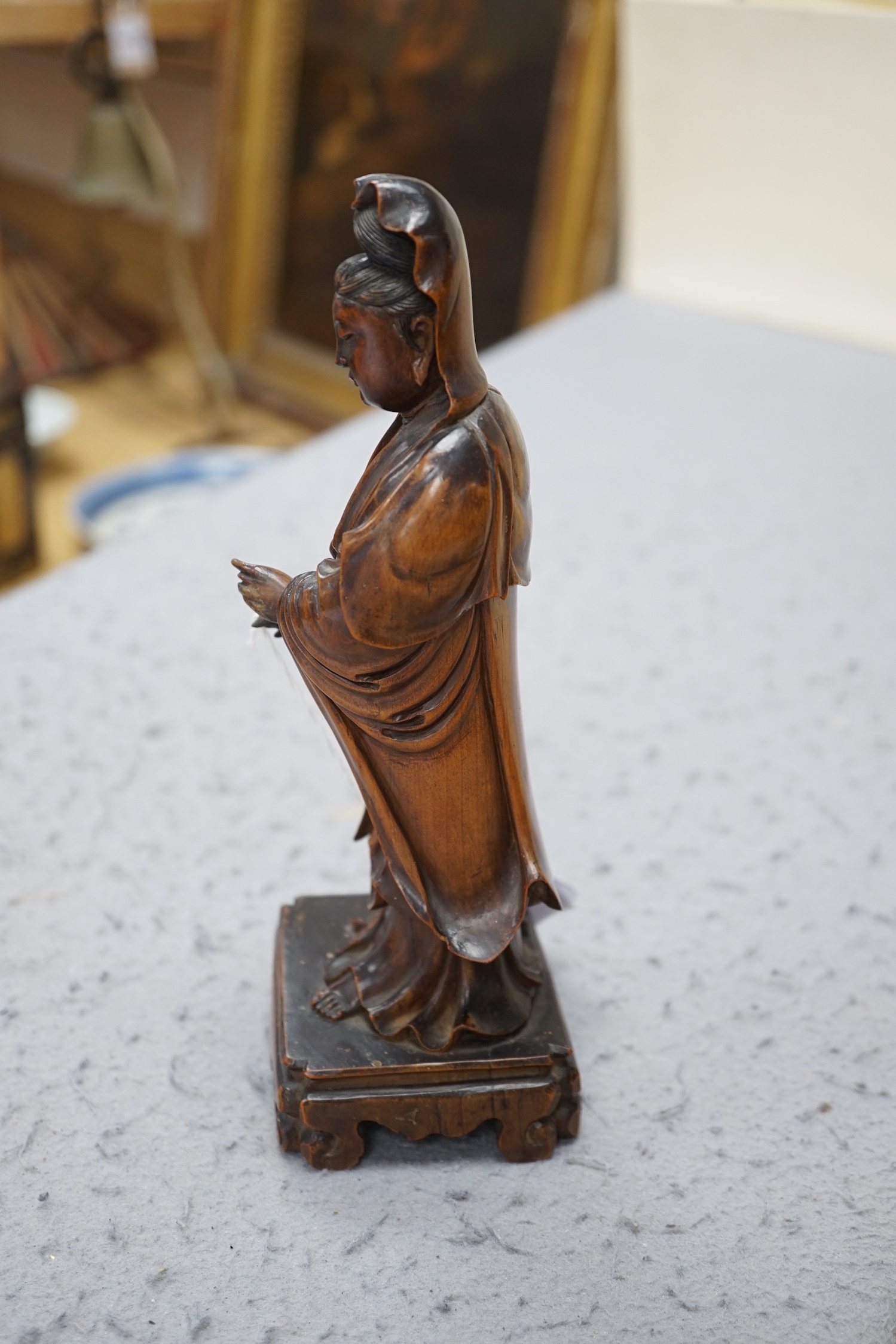 A Chinese boxwood figure of Guanyin, Qing dynasty, 22.5cm